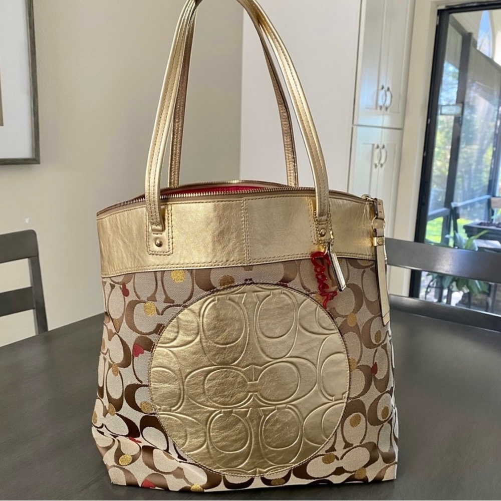 Authentic Coach Laura Secret Admirer Multi
Gold and Red Heart Bag